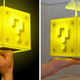 Illustration for article titled Touch Sensitive Coin Block Lamp Will Eventually Pay For Itself, Right?
